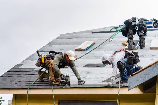 Professional Roofing technician working in Winthrop, ME
